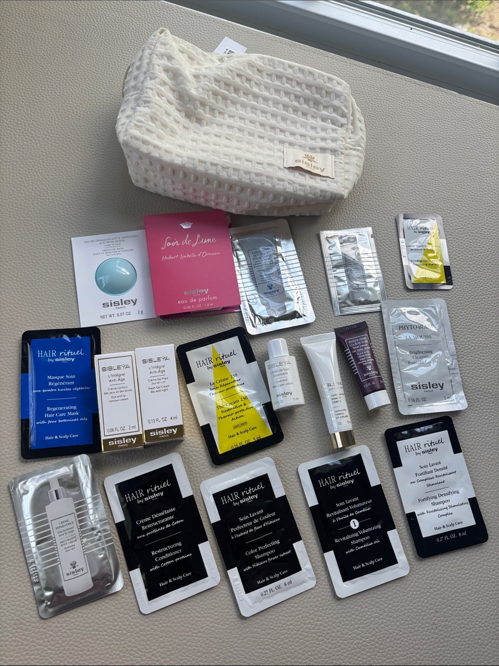 Sisley  Sample Lot with Cosmetic Bag